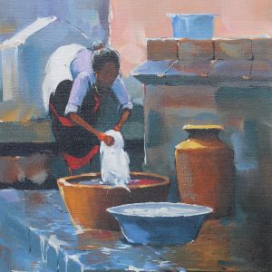 Women washing clothes at well