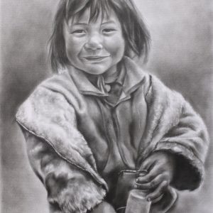 A smiling Tibetan girl