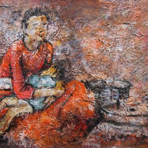 A working mother breast feeding her child